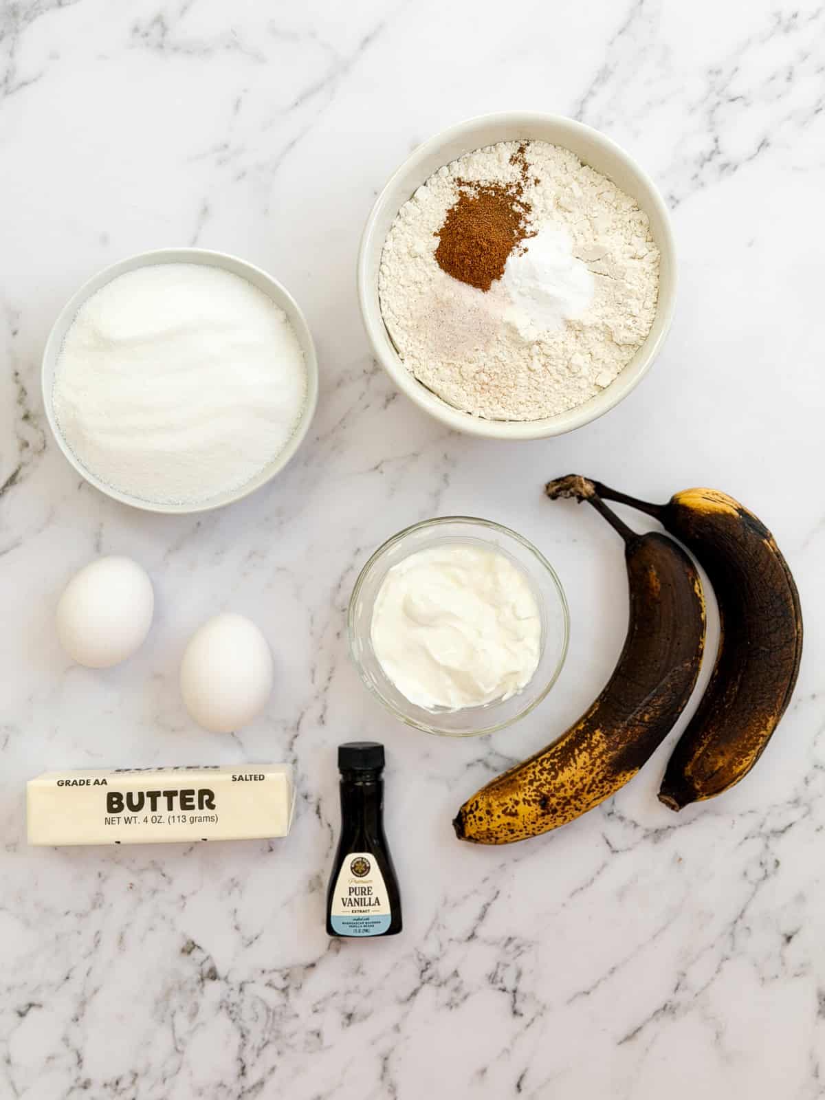 all the ingredients to make this sour cream banana bread.