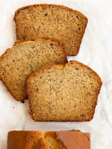 sour cream banana bread cut into slices.