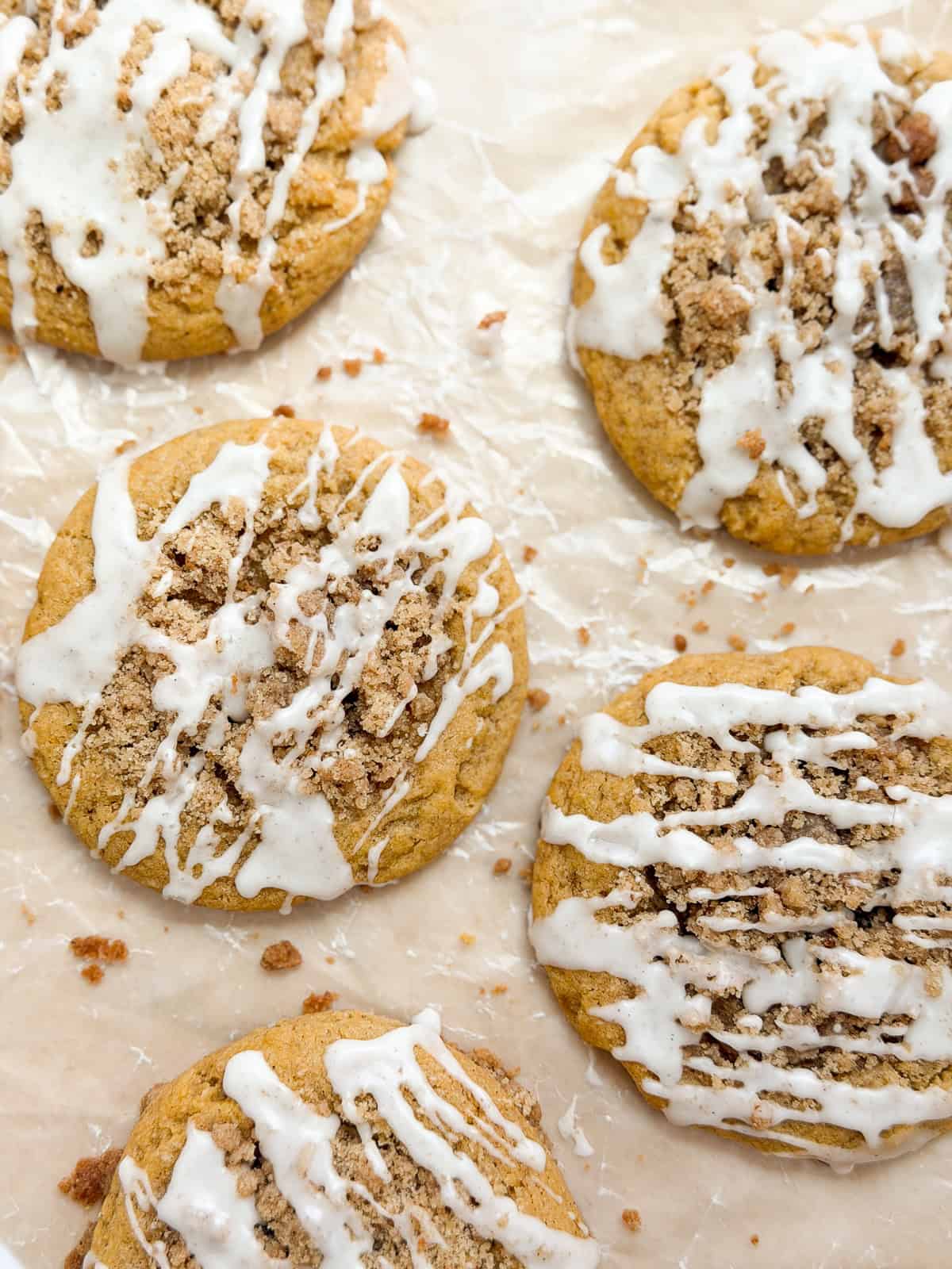 a close up of a few pumpkin coffee cake cookies.