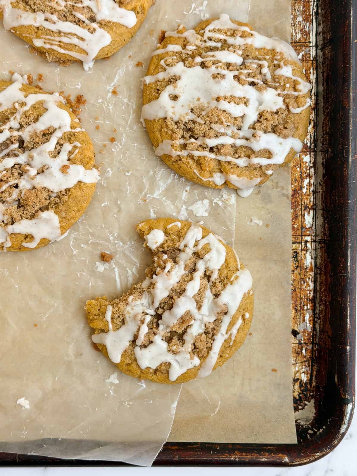 a bite missing from one of the pumpkin coffee cake cookies.