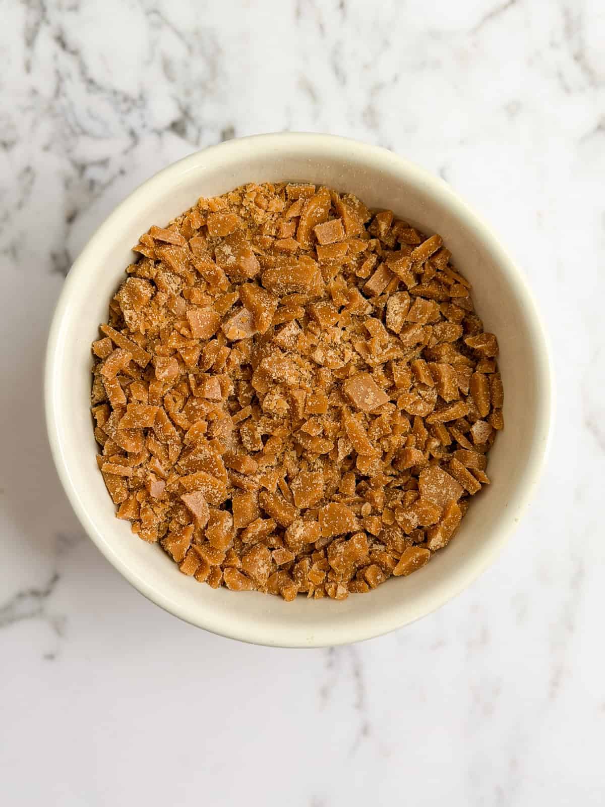 a bowl of homemade toffee bits.